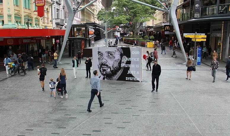 Ms Parra's artwork on display in Brisbane CBD draws public attention to individuals wrongfully convicted of crimes they didn't commit. Picture Sky Parra.