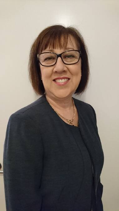 HERE TO HELP: To make an appointment with Total Hearing call Anne Davis, who not only manages the office, but is a part of the family. Phone on (07) 3207 9731.
