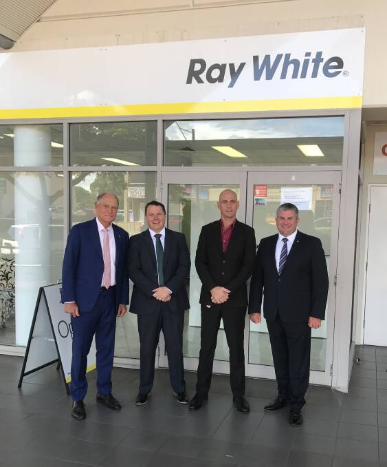 SPECIAL VISIT: Chairman of Ray White Brian White with selling principal Mark Taylor, principal Scott Martin and Tony Warland, Ray White Queensland CEO.
