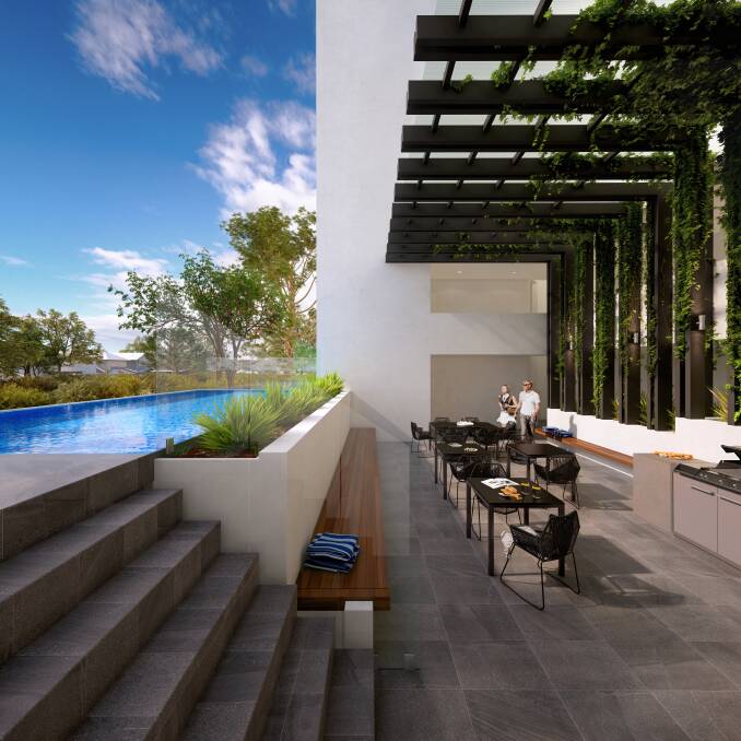 RESORT STYLE LIVING: An exquisite pool deck and barbecue area create wonderful entertaining options for Reflections' residents who also have access to a large multi-purpose room.