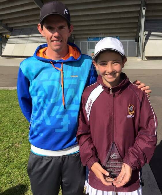 Redland Bay tennis coach Tim Low with tennis protege Lara Walker who won the National Junior Championship. 