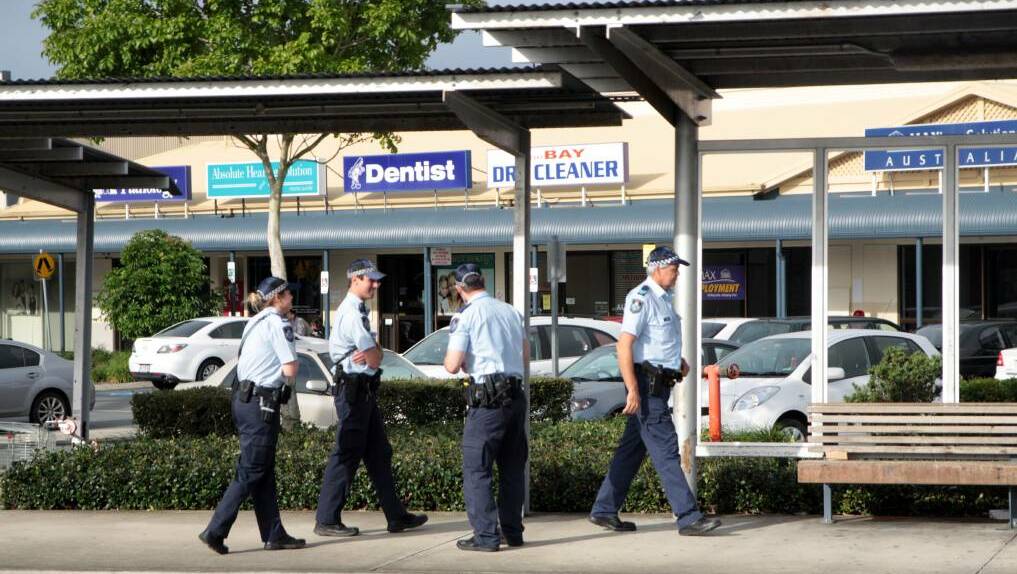 Police at Victoria Point shops. 