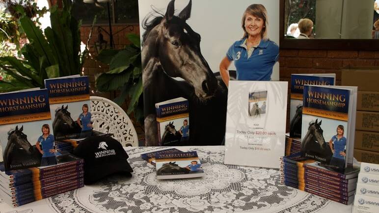 BOOK LAUNCH: a book has helped raise $4000 for a disabled riding school in Thornlands. PHOTOS: Mike Morris