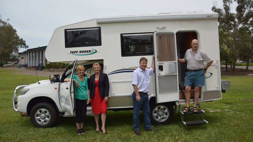 Redland mayor Karen Williams and councillor Paul Gleeson with RV travellers Jim and Roz Grevett at John Fredericks Park, Capalaba, where one of the RV dump sites is being installed.
