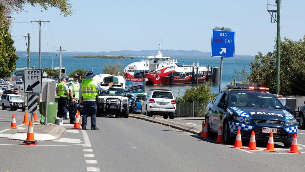 Police on Stradbroke Island in 2013. Preparations are already under way for this year's event.