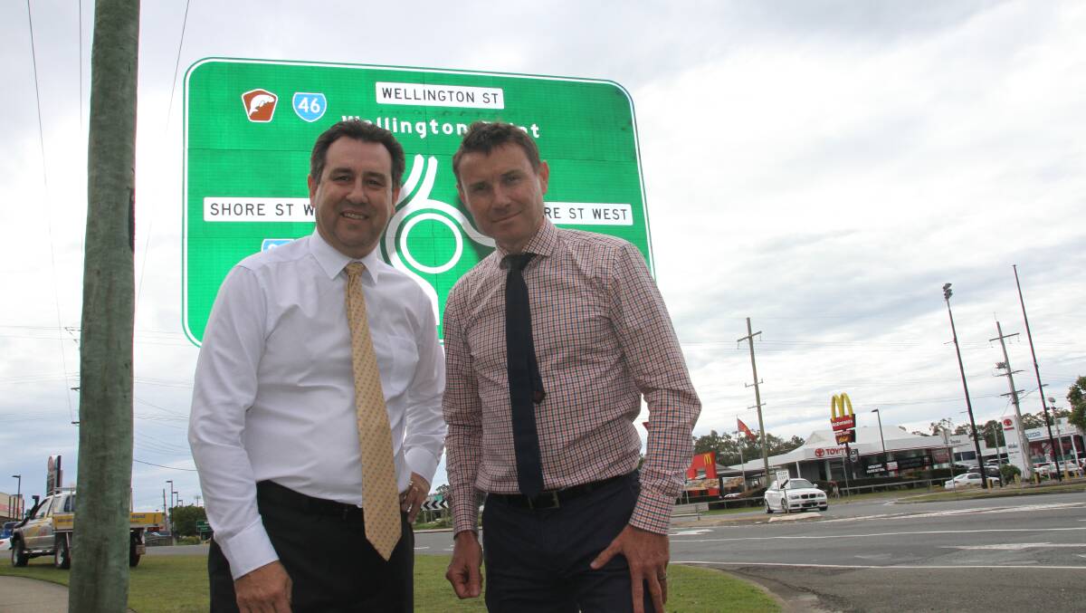 Cleveland MP Mark Robinson, left, with Bowman MP Andrew Laming at the busy Shore Street roundabout which will be replaced with a $3.5million intersection under an election pledge. PHOTO: Judith Kerr 