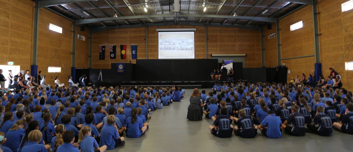 CENTURY OF CHANGE: Students at Victoria Point State School marked the school's 100th year on Monday with a birthday ceremony in the school's hall.  