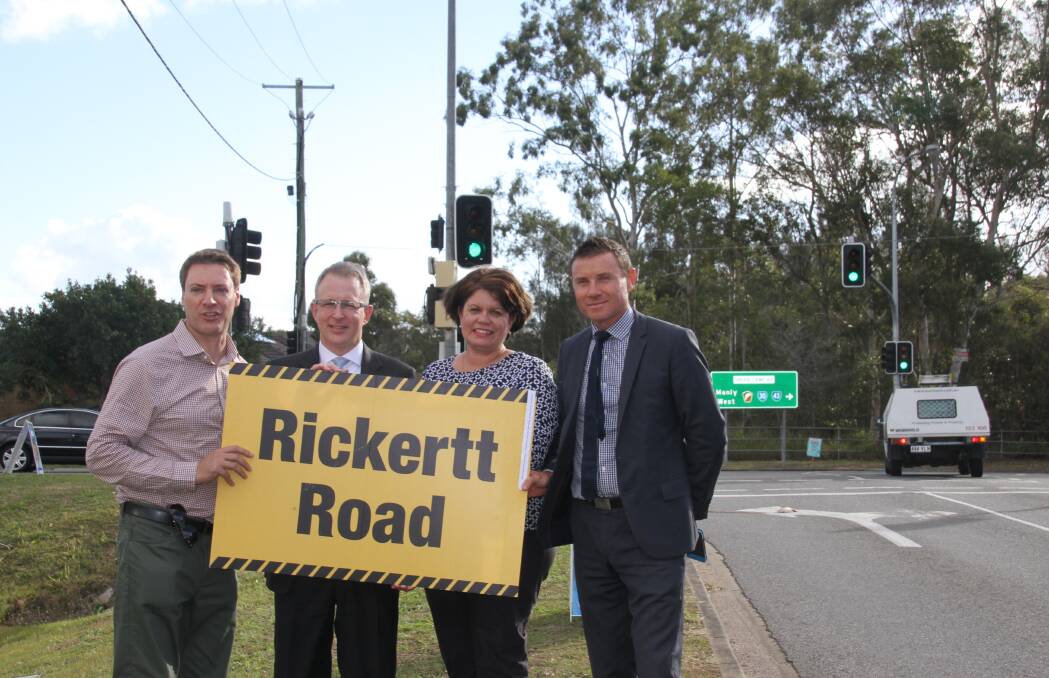 Bowman MP Andrew Laming, right, has promised $5million to upgrade the busy Rickertt and Green Camp roads intersection if re-elected. Mr Laming met with Bonnor MP Ross Vasta, left, federal Minister for Major Projects Paul Fletcher and Senator Jo Lindgren on Tuesday. PHOTO: JUDITH KERR 