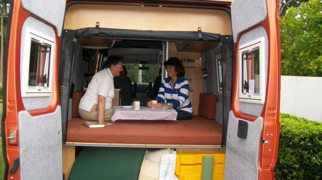 DRIVING AMBITIONS: RV traveller Pat Martin, left, with Redland councillor Wendy Boglary. Ms Martin and her partner, Ian, travel short trips in their recreational van. Redland City Council hopes to attract more travellers.