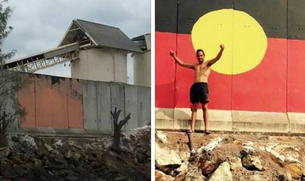 The fence where the mural flag was painted over before indigenous artists repainted the mural on Australia Day. 