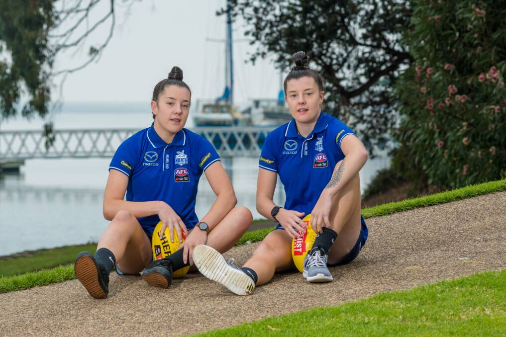 COUNTDOWN IS ON: Chloe and Libby Haines are part of the Tasmanian group at North Melbourne for 2020. Picture: Phillip Biggs