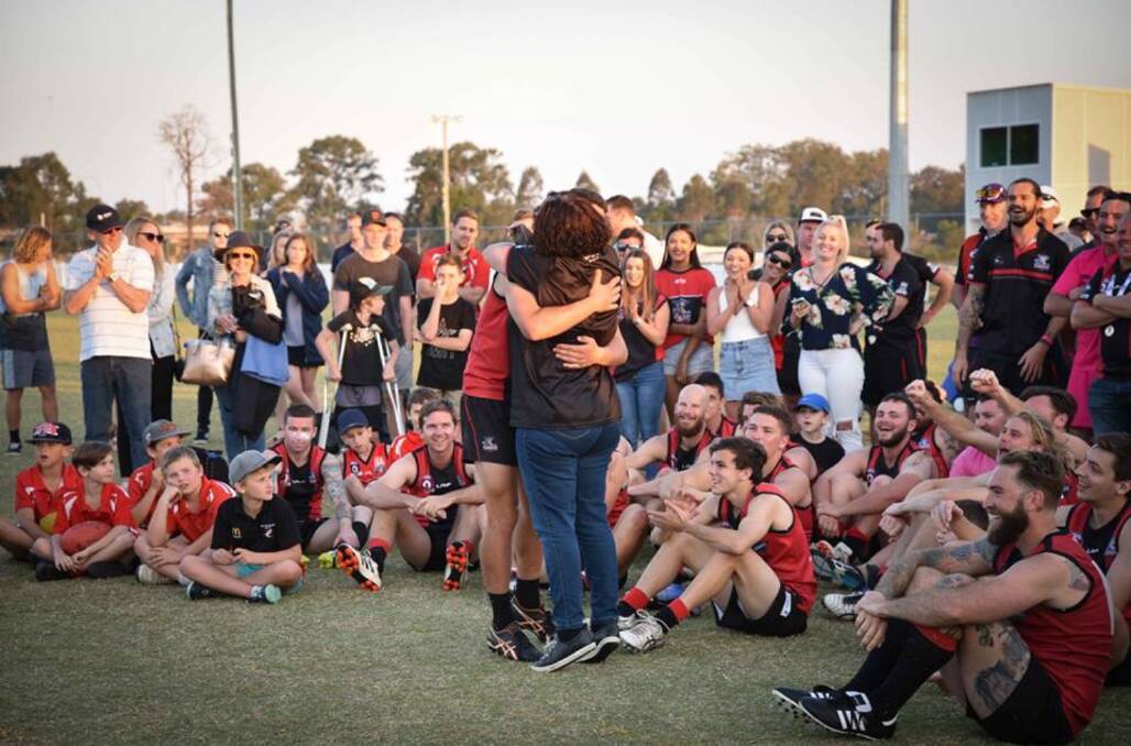 FOOTY FAMILY: Mum Pauline Eadie congratulates her son Liam after being named 'Best on Ground' in the 2017 grand final.