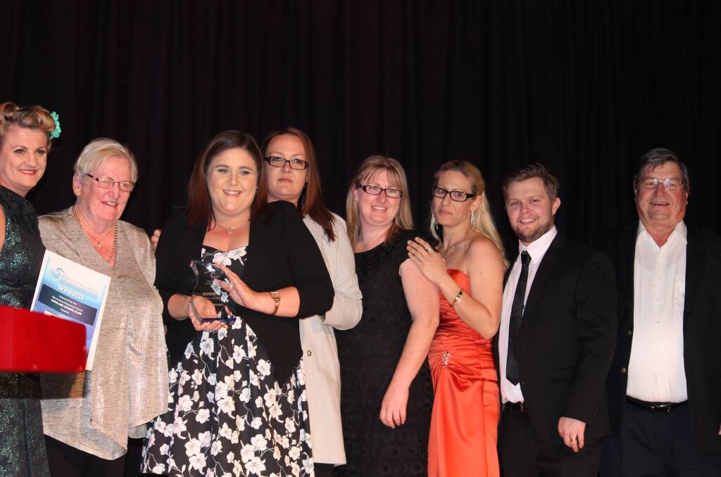 FLASHBACK: A team of last year's winners who reaped the rewards of being promoted in the public domain. Telephone Naomi Cauley on 0478 202 306.