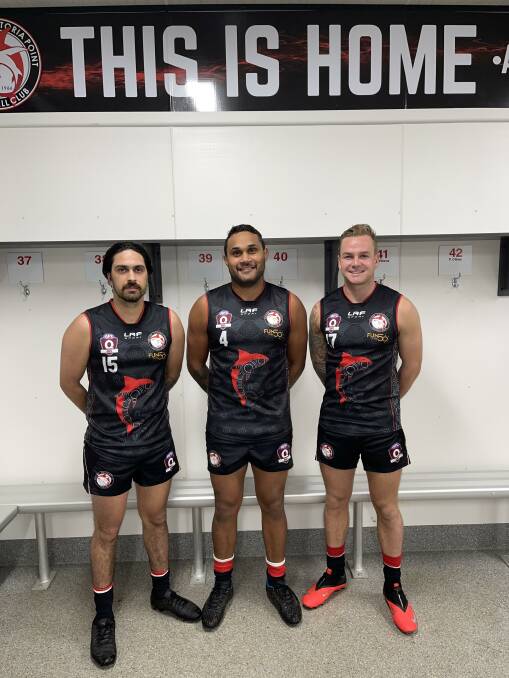 RESPLENDENT: Peter Yagmoor and his Redland-Victoria Point Sharks teammates showcase the club's Indigenous guernsey for Sir Doug Nicholls Round. Photo: supplied