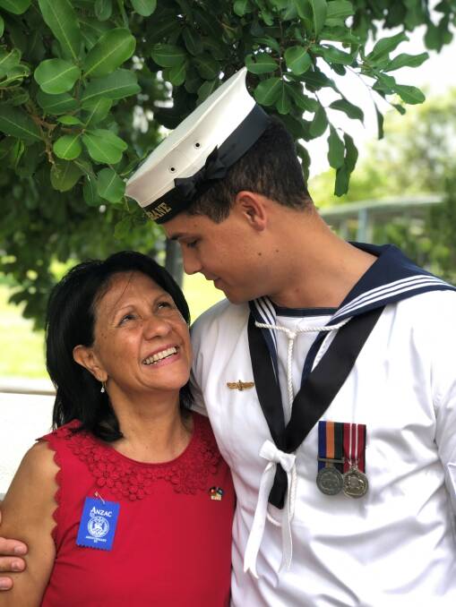 ANZAC: Aunty Robyn Lucas, a teacher aide at Victoria Point State High School, with son Alan, who attended the school's Anzac ceremony while on leave from the Navy.