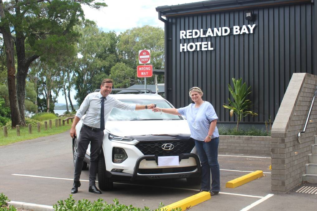PUB WIN: ALH Group operations manager Josh Bibby with Sarah and her new car.