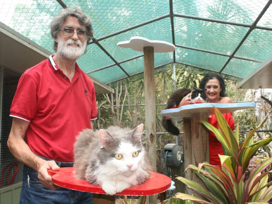 BIRTHDAY: Michael Auld and Lynda Du Vallier with two of their furry friends. Photo: Stacey Whitlock