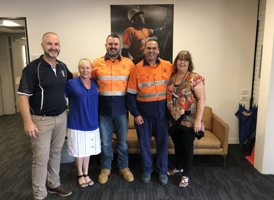 HELPING HAND: Dave Breeze, Bel Kibbler and Brenda Rooney from AITC with Caine Ansell and Justin Geange from MATES in Construction.
