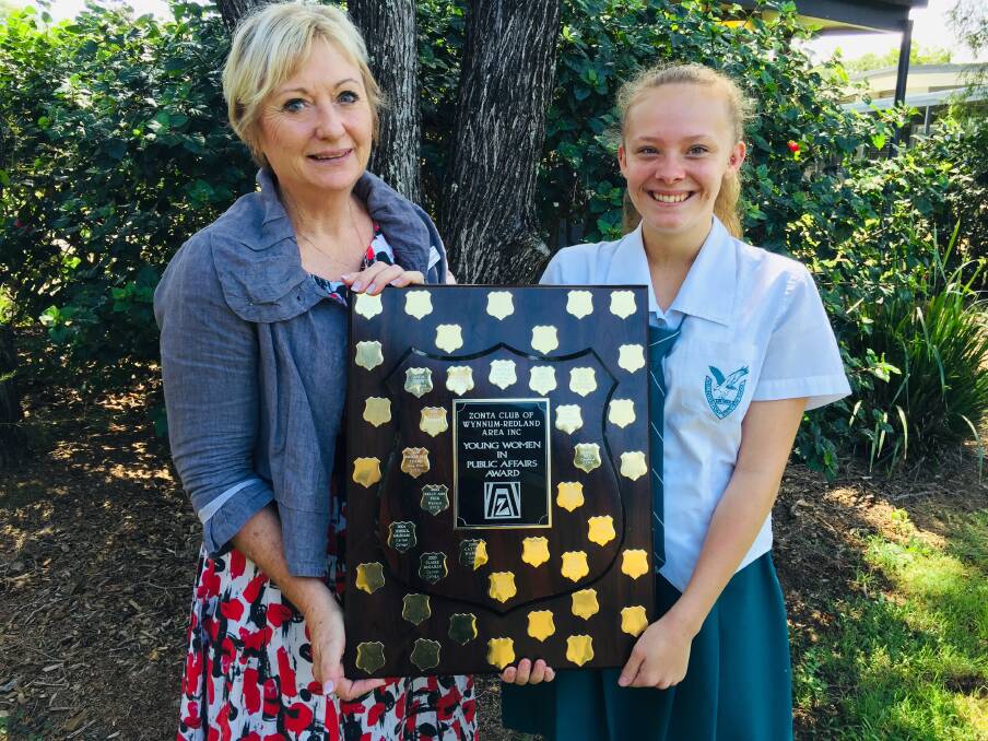 PROUD: Mikayla Richards and Wellington Point State High School principal Robyn Burton-Ree with the Zonta Young Women in Public Affairs shield.