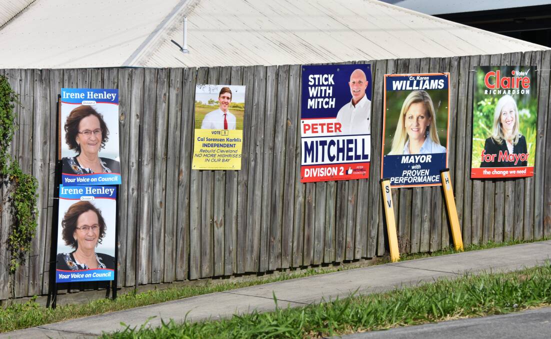 ROADSIDE: Candidates have flocked to this Cleveland fence to hang their signs.