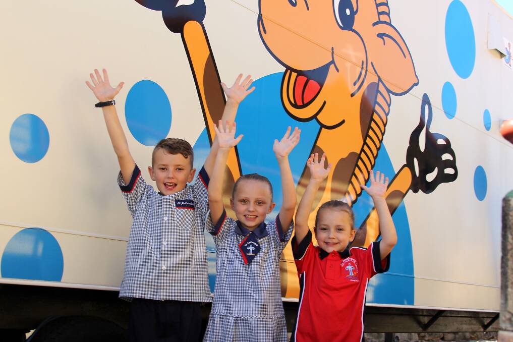 HEALTHY HAROLD: Students from St Anthony's Catholic Primary School with the Life Education mobile classroom.