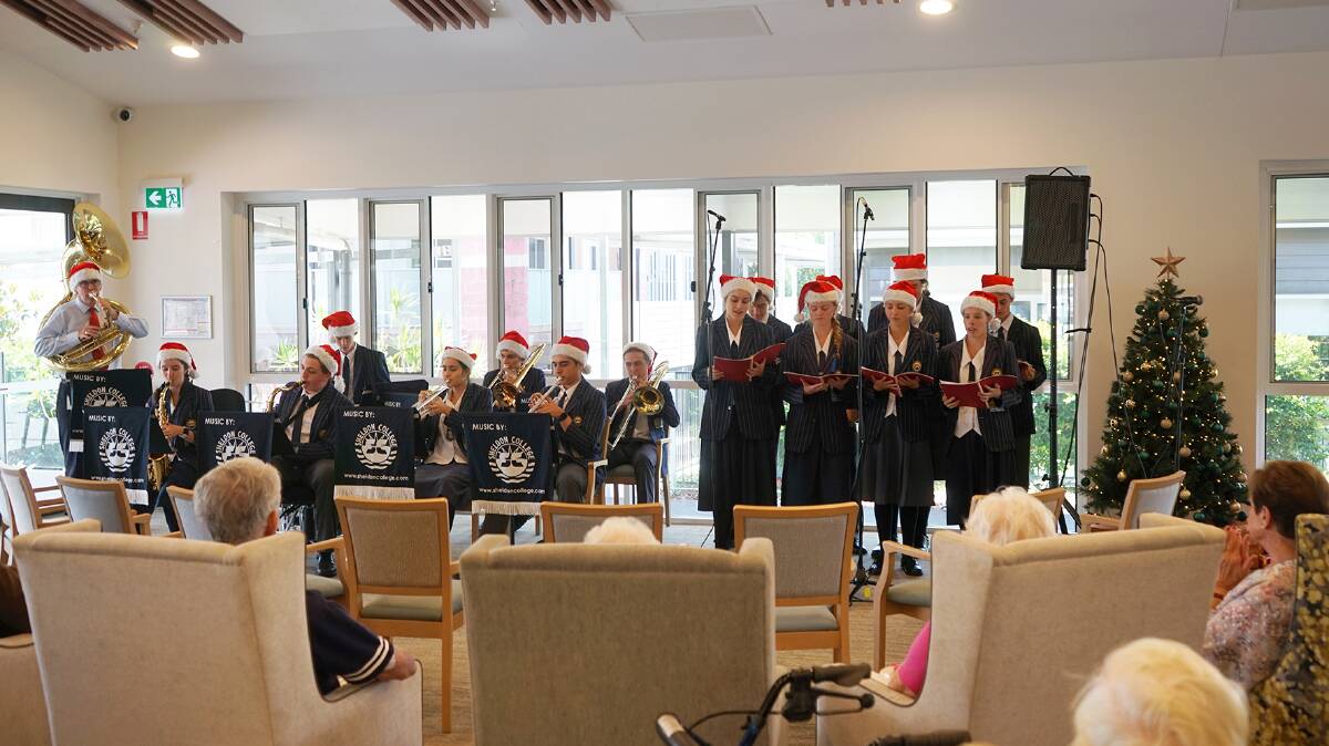 FESTIVE: Residents at aged care facilities around the Redlands had a ball as students performed carols.
