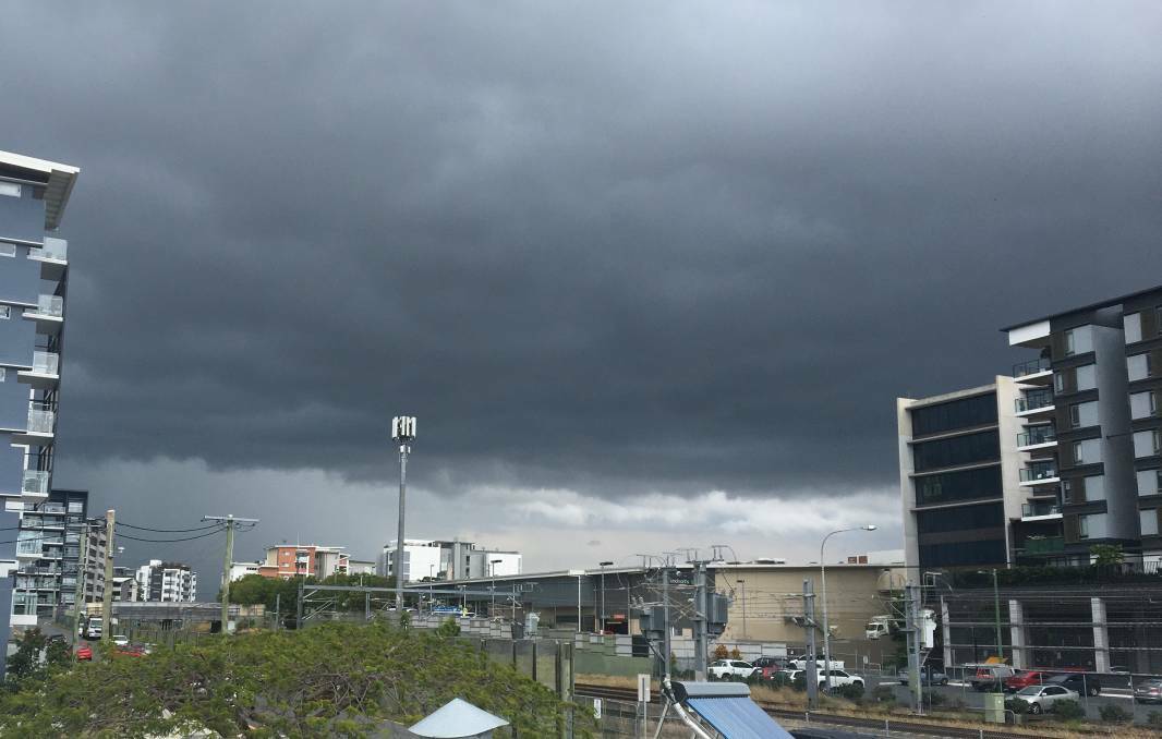 GLOOMY: A band of thunderstorms swept through south-east Queensland on Sunday afternoon.