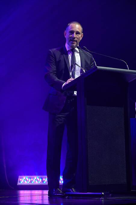 GOING, GOING, GONE TO GAVIN: Mr Croft was presented with the award for REIQ Auctioneer of the Year on Sunday night.