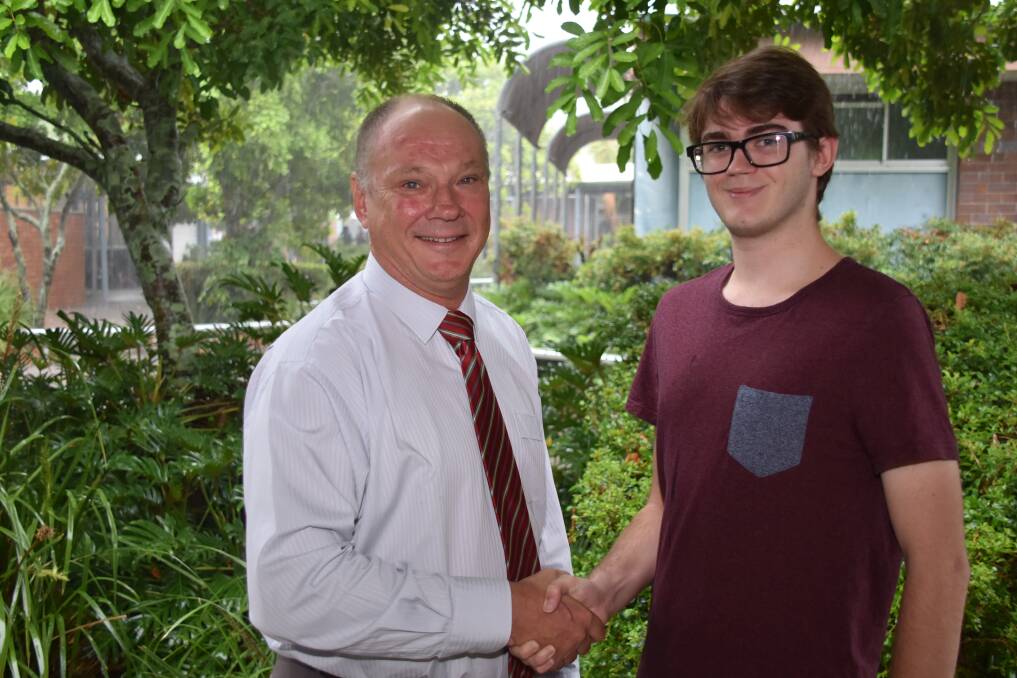 BIG WIN: Victoria Point State High School principal with scholarship winner Dalton Shorten.