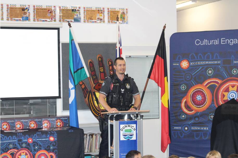 LOOK TO THE STARS: Senior Constable Jai Taylor spoke at the unveiling of a new plaque for Dunwich Police Station. Photo: Queensland Police Service