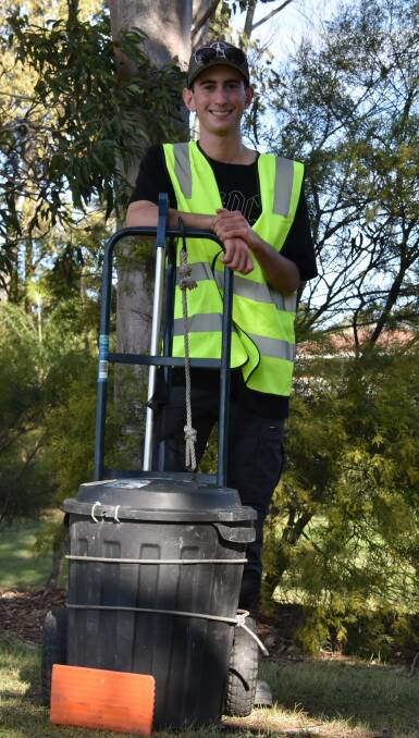LITTER LEGEND: Mr Utz with his rubbish collecting contraption. 