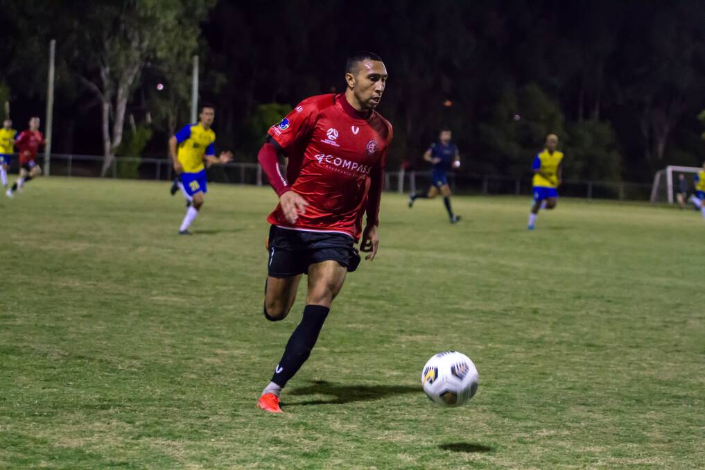 ON THE BALL: Striker Guil Santana on ball during the Red Devils NPL Qld clash with the Brisbane Strikers at the Compass Grounds Friday night.