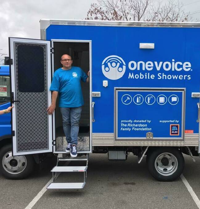 SUPPORT SERVICES: One Voice founder Josh Wilkins with a mobile shower van.