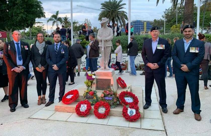 SUPPORT: Young Veterans Redlands members Andrew Davis, Samantha Mason, Lee Mason, patron and local councillor Paul Golle and president Adrian Aiple at the Cleveland Anzac Day dawn service.