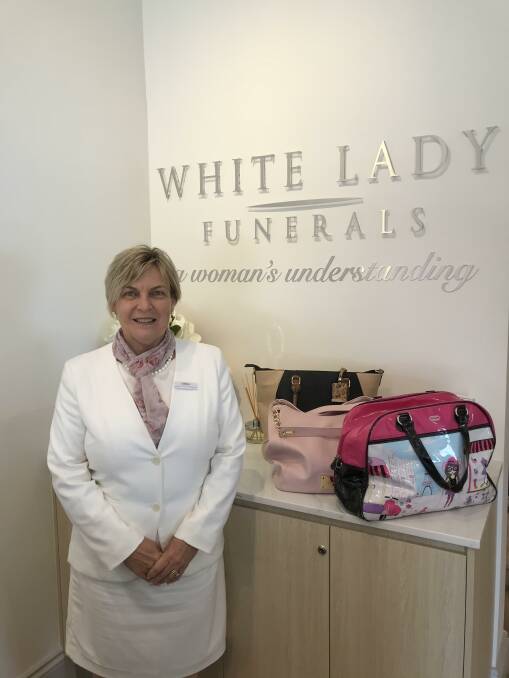 GENEROSITY: Victoria Point White Lady Funerals location manager Debbie Edmands with some of the Share the Dignity donations.