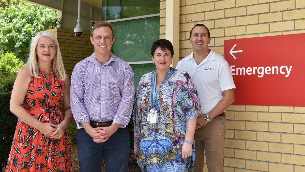 HOSPITAL STOUSH: Redlands MP Kim Richards, Health Minister Steven Miles, Redland Hospital facilities manager Sue Freiberg and Capalaba MP Don Brown at the hospital in 2018, when Mr Miles announced the business case for the car park. Photo: Hannah Baker