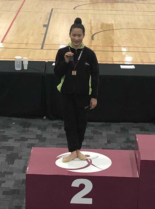 PROUD: Premier Gymnastics athlete Aileen Chiang came fourth overall in her category.