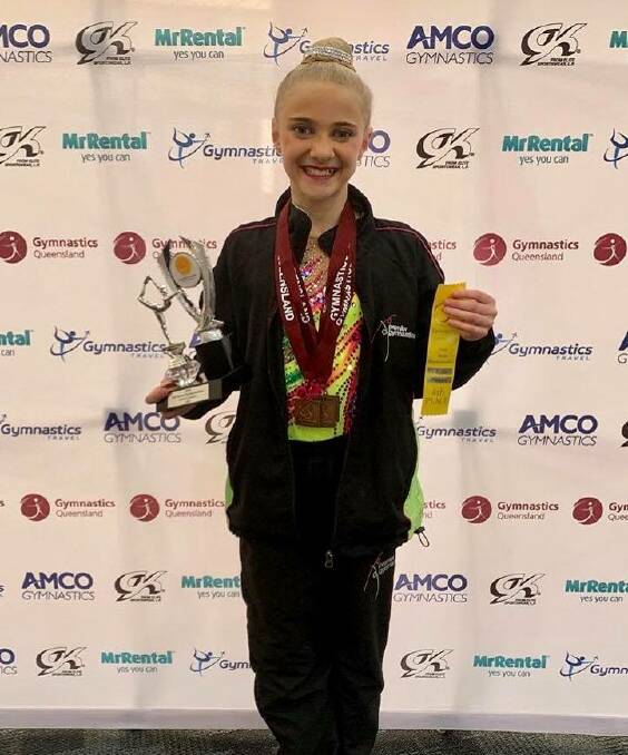 WINNERS ARE GRINNERS: Premier Gymnastics athlete Jayla Thirkettle, 10, won bronze overall in her category.