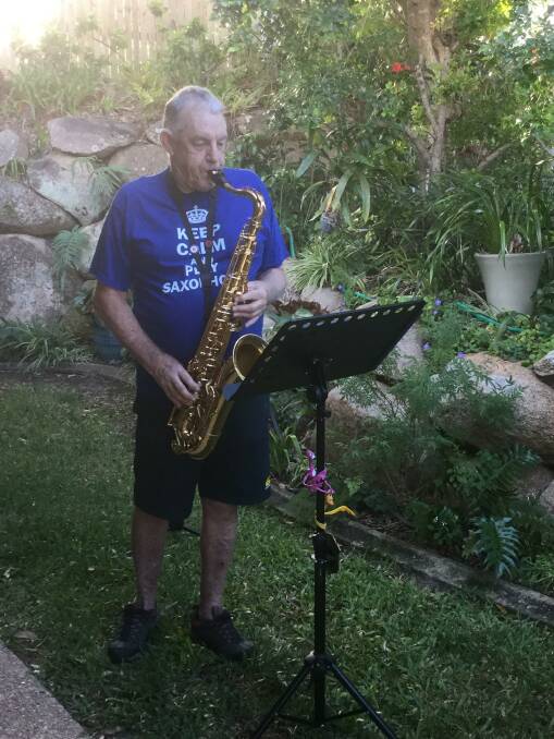 KEEP CALM AND PLAY SAXOPHONE: Malcolm Brooks plays hits from the 50s, 60s and 70s in his secluded garden for listeners outside or on their balconies.