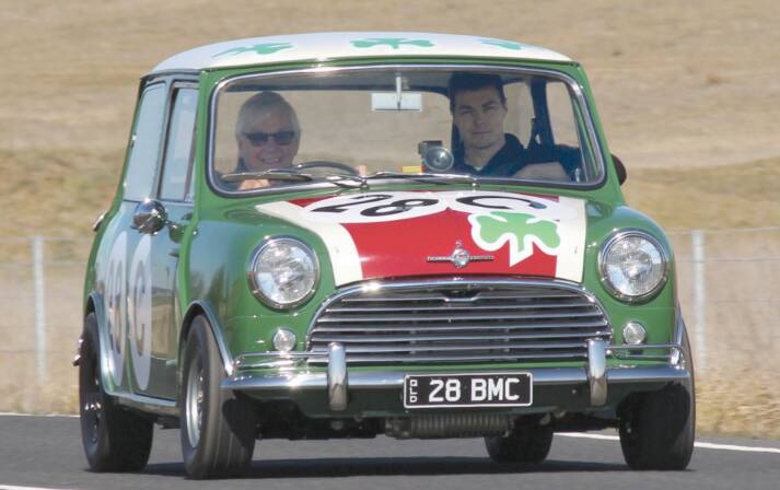 RESTORED: Brian Foley drives a MINI he drove at Bathurst in 1967 with Mr Coates in the passenger seat.