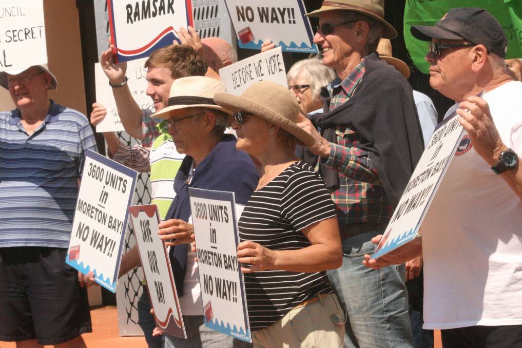 RALLY: Redlands2030 and community members rallied outside the council chambers on Wednesday calling for council to "reveal the Toondah deal".