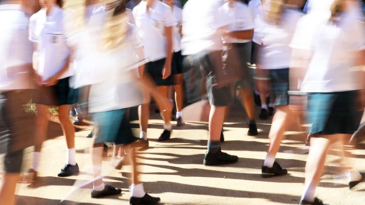 SCHOOLS OPEN, FOR NOW: Students are still attending school in Queensland but some parents are choosing to keep their children home.