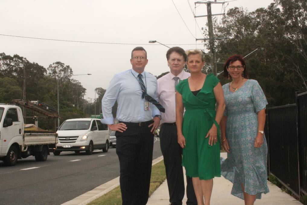 NOT GOOD ENOUGH: Councillors Paul Golle, Lance Hewlett, Karen Williams and Julie Talty near a section of Cleveland -Redland Bay Road that has not yet been duplicated. 