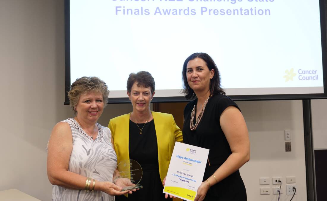 TOP FUNDRAISERS: Head of Cancer Council Queenlsand Chris McMillan (middle) with Redlands Volunteer Branch members Tish Henderson and Jill Watson.