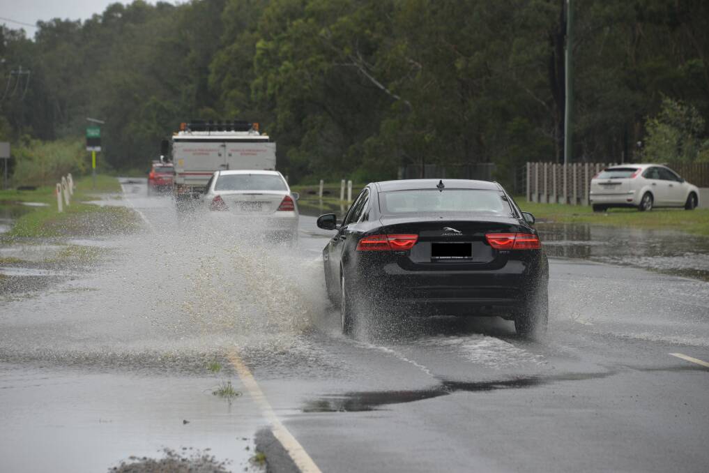 WATER HAZARD: Rickertt Road was open on Tuesday afternoon with a couple of inches of water over the road.