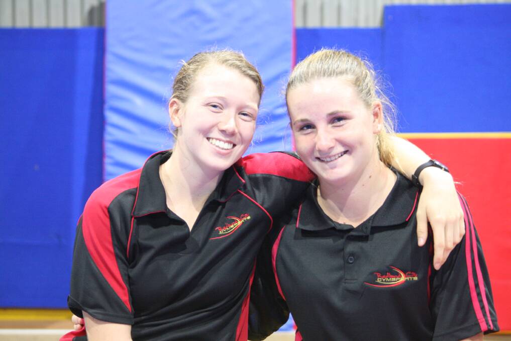 WORLD COMPETITION: Charlotte Johnstone (right) photographed with fellow Gymsports athlete Erin Hopgood earlier this year. 