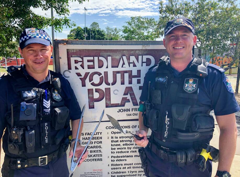 YOUTH ENGAGEMENT: Acting Sergeant Craig Searston (left) manned a barbecue at the Capalaba skate park.