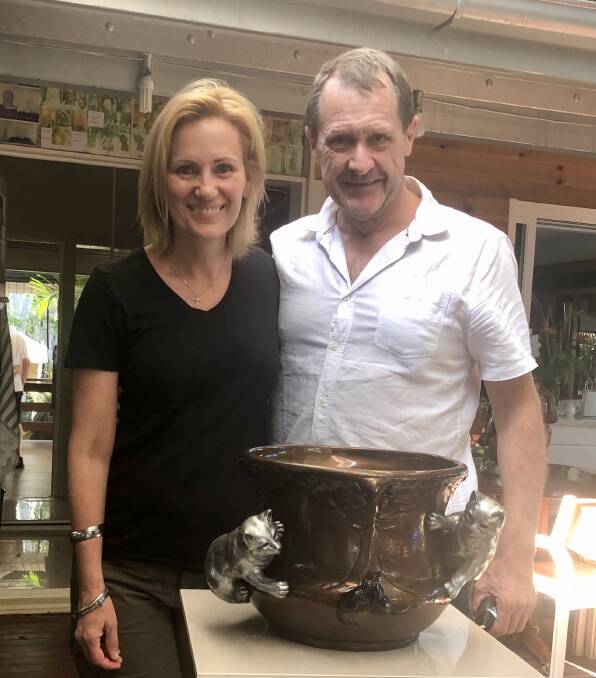 GRATEFUL: Anne and Glen Dunne with their newly-restored flower pot.