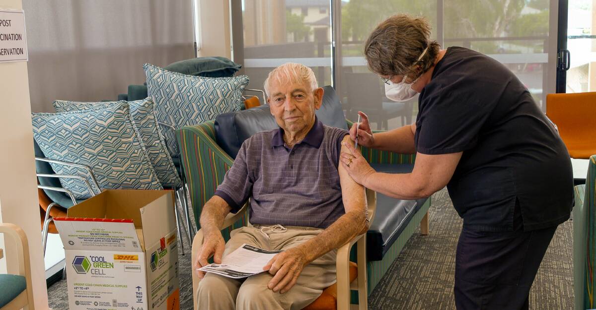 COVID JAB: Aged care home resident Cliff Canhan, 89, gets his COVID-19 vaccine. He said there was no problem with the shot.