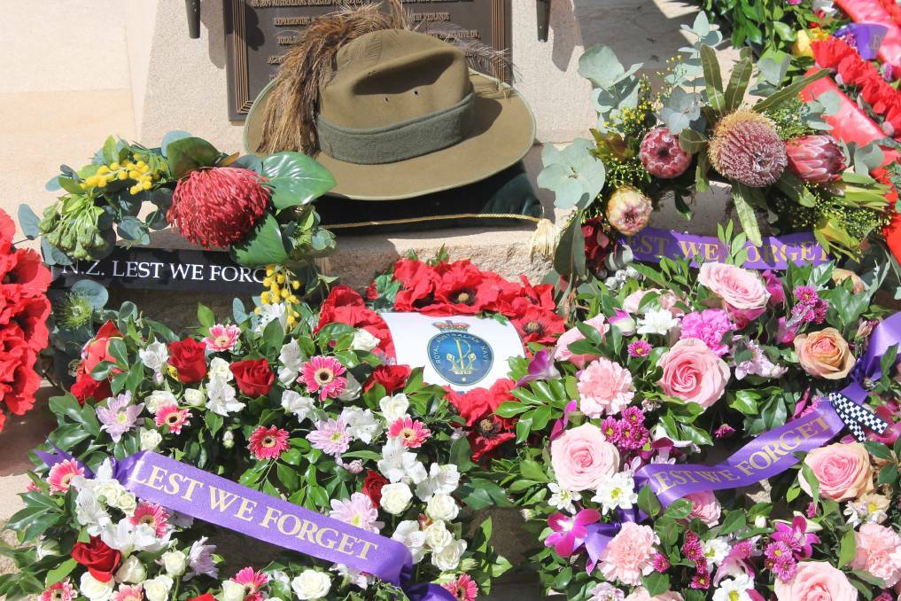 LES WE FORGET: Wreaths laid at the main service in Cleveland in 2018. Photo: Cheryl Goodenough